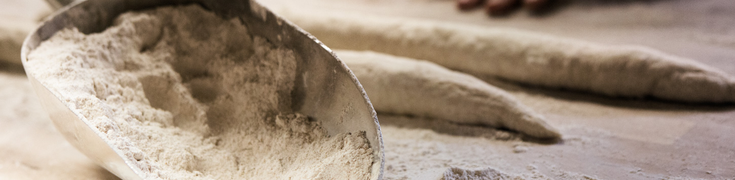 Rolled baguette dough and flour